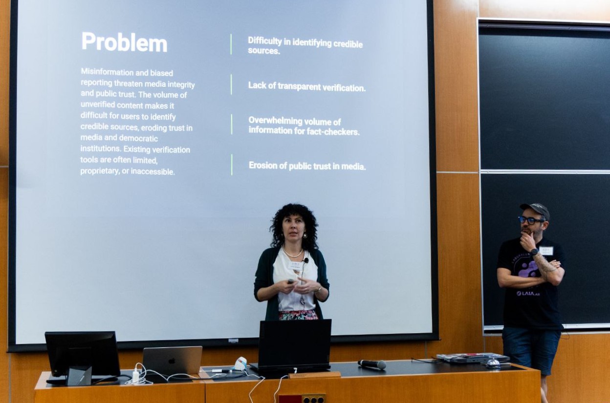 Polina presenting on misinformation and source credibility at the AI & Democracy Hackathon
